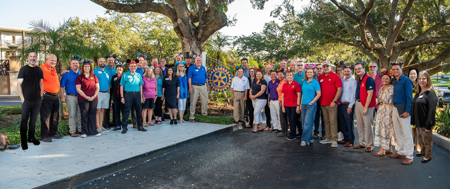Members of the Rotary Club of Lake Buena Vista during a service project gathering Members of the Rotary Club of Lake Buena Vista during a service project gathering