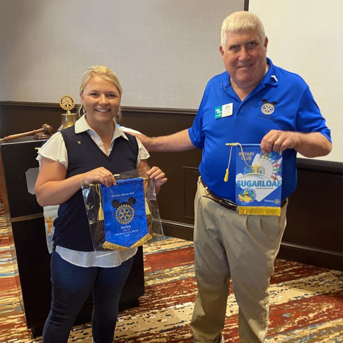 Past President Dan Ehrlich exchanging banners with a member of the Rotary Club of Sugarloaf during a member’s visit to our club Past President Dan Ehrlich exchanging banners with a member of the Rotary Club of Sugarloaf during a member's visit to our club